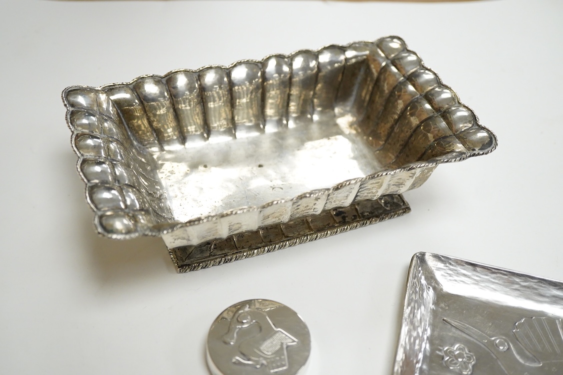 A continental 800 standard oblong shaped dish, of fluted design, together with a Peruvian sterling dish and similar pill box and a George V silver cigarette case, 16.6oz.